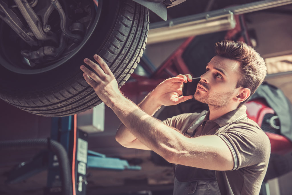 technician working on a car